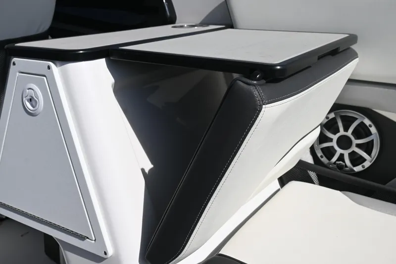 Slide: The Image of 2023 Yamaha Boats 252SD interior detail with sleek seating and modern design. - 16