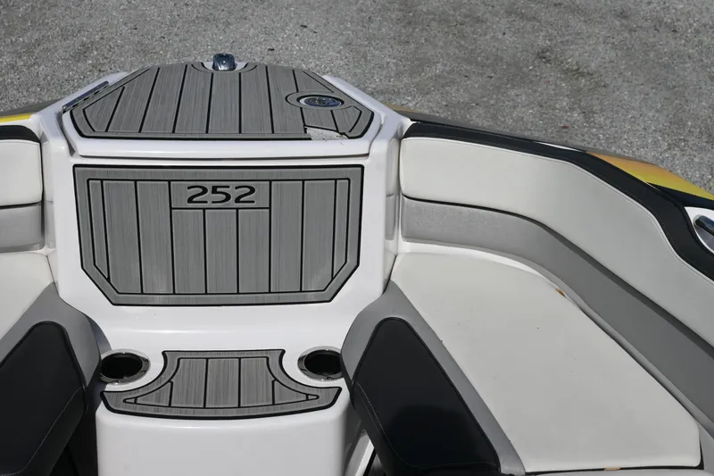 Slide: The Image of 2023 Yamaha Boats 252SD interior with sleek seating and modern design. - 23