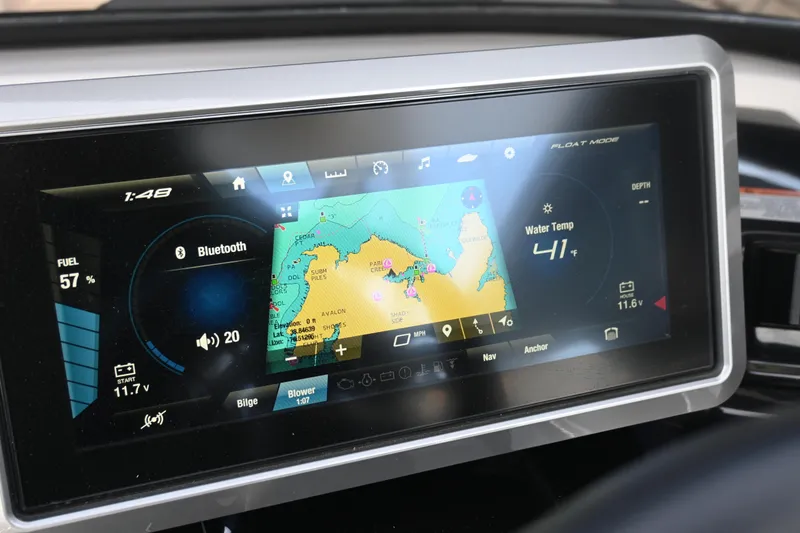 Slide: The Image of 2023 Yamaha Boats 252SD dashboard with navigation and Bluetooth display. - 25