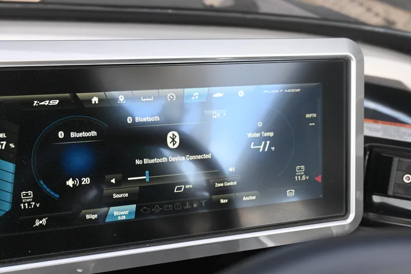 Slide: The Image of Dashboard display of 2023 Yamaha Boats 252SD, showing Bluetooth and water temperature settings. - 26