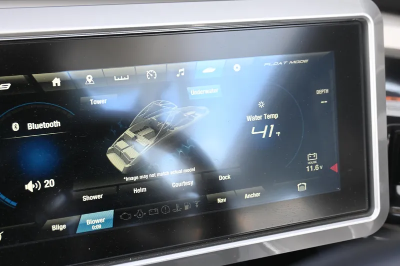 Slide: The Image of Touchscreen display of 2023 Yamaha Boats 252SD showing water temperature and control options. - 27