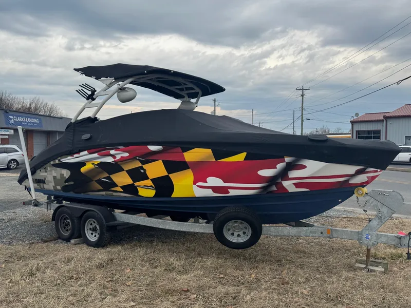 Slide: The Image of 2023 Yamaha Boats 252SD with Maryland flag design on trailer. - 8