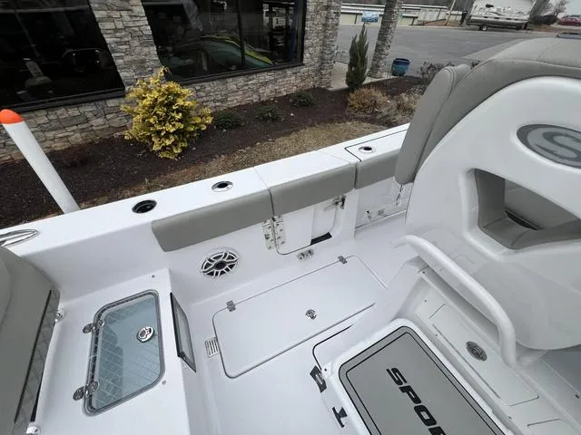 Slide: The Image of 2025 Sportsman Heritage 261 boat interior with seating and storage compartments. - 6