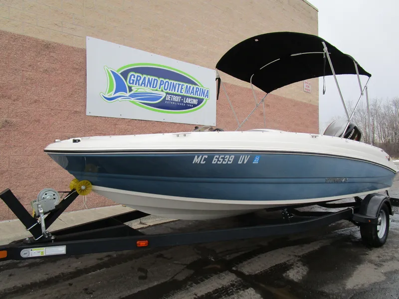 Slide: The Image of 2022 Stingray 182 boat on trailer at Grand Pointe Marina. - 4