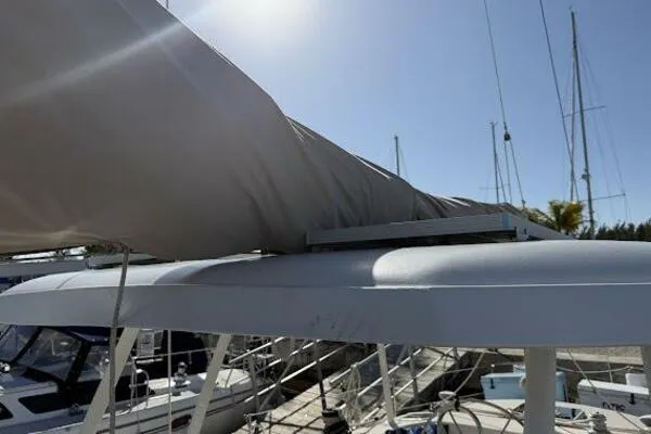 Slide: The Image of Sailboat Catalina Morgan 440, 1989 model, docked with covered sail, sunny day. - 21