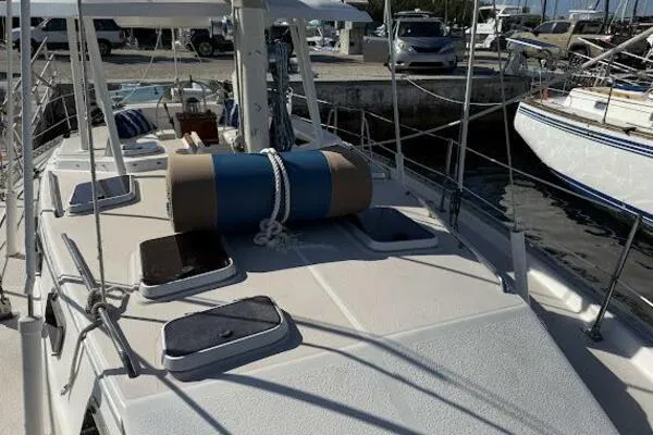Slide: The Image of 1989 Catalina Morgan 440 sailboat deck with equipment, docked at marina. - 31