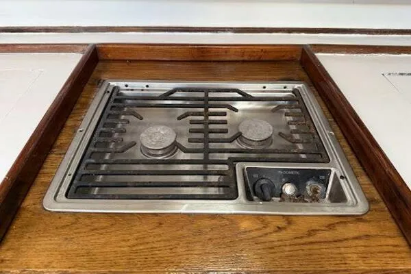 Slide: The Image of Stainless steel stove on 1989 Catalina Morgan 440 yacht, wooden countertop. - 49