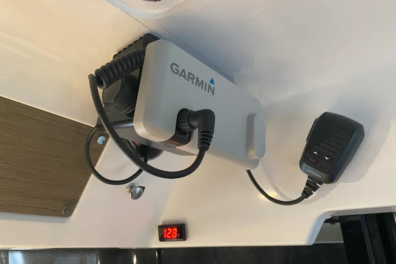 Slide: The Image of Garmin device installed in 2020 Jeanneau NC Sport 695 boat interior. - 17