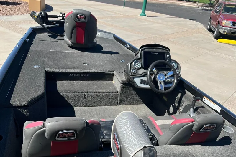 Slide: The Image of 2019 Ranger RT178 boat interior with steering console and seating. - 4