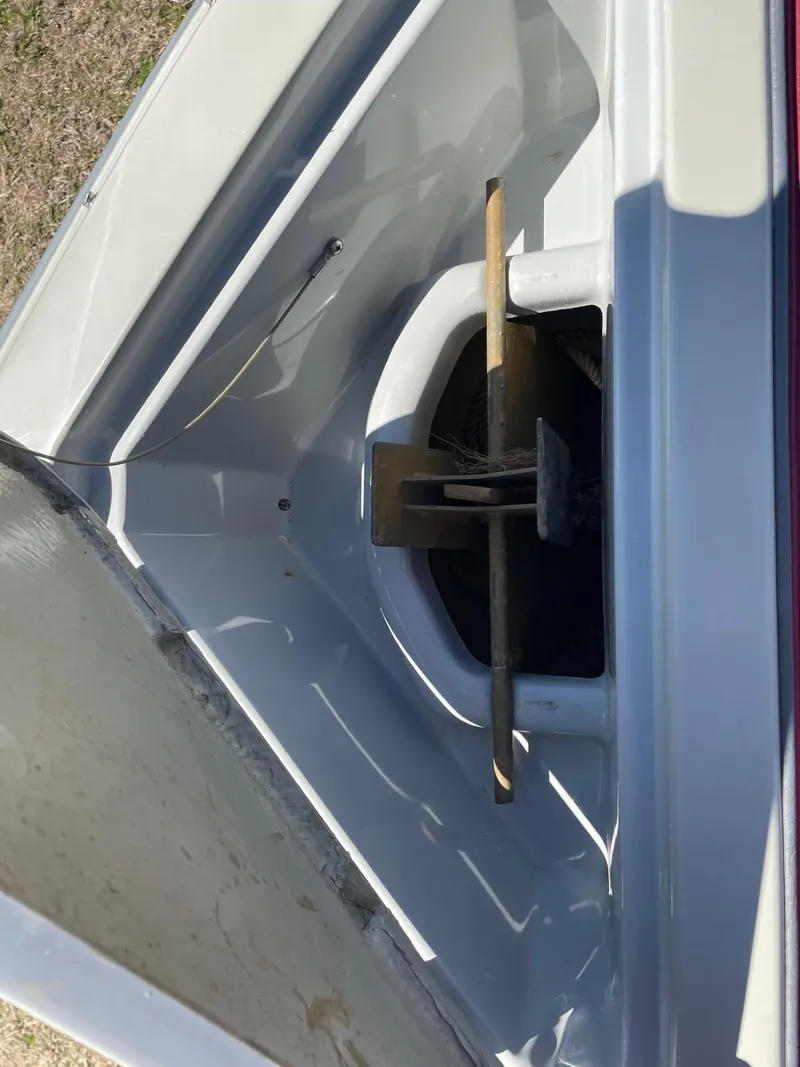 Slide: The Image of 1988 Four Winns 200 Horizon boat anchor compartment, open view. - 7