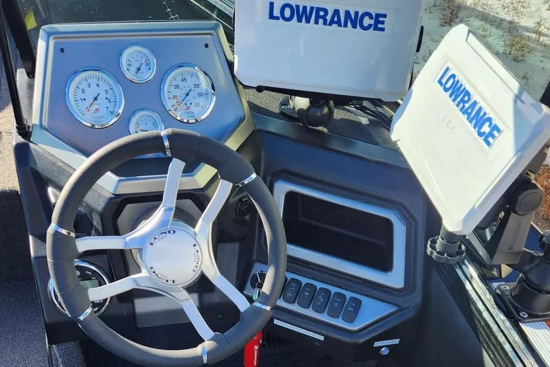 Slide: The Image of Dashboard of 2022 Lund 1975 Tyee Limited boat with Lowrance electronics. - 9