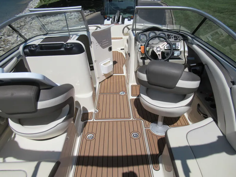 Slide: The Image of 2014 Yamaha Boats 242 Limited interior with sleek design and comfortable seating. - 11