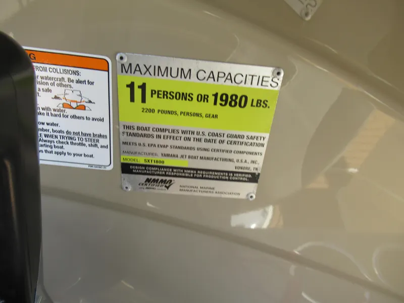 Slide: The Image of 2014 Yamaha Boats 242 Limited capacity label: 11 persons or 1980 lbs maximum. - 13