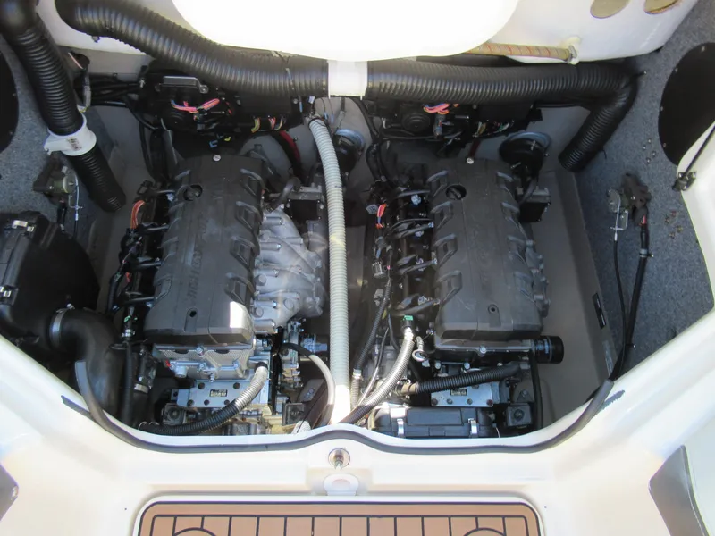 Slide: The Image of 2014 Yamaha Boats 242 Limited engine compartment with dual engines and visible components. - 25