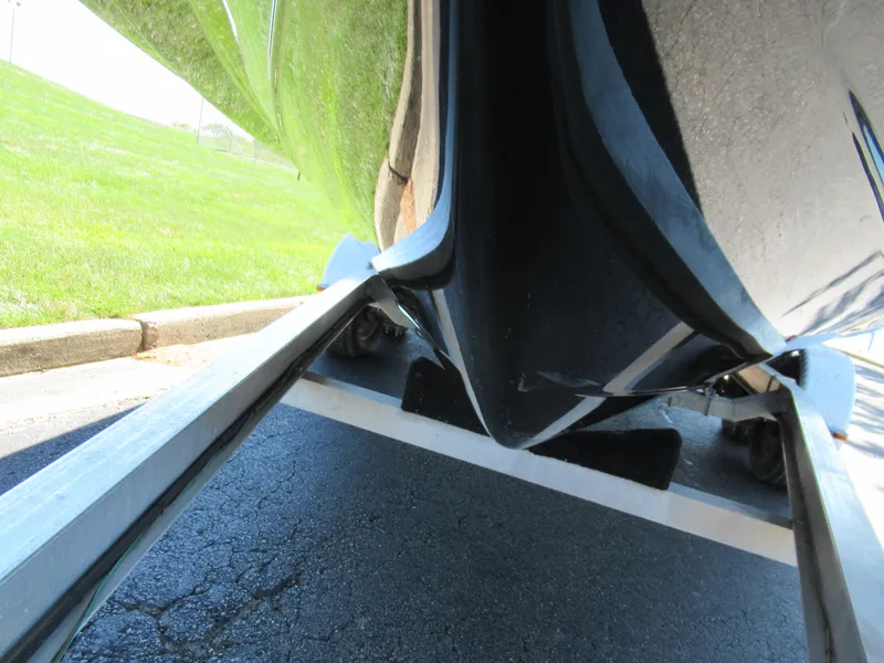 Slide: The Image of Bottom view of a 2014 Yamaha Boats 242 Limited on a trailer. - 7