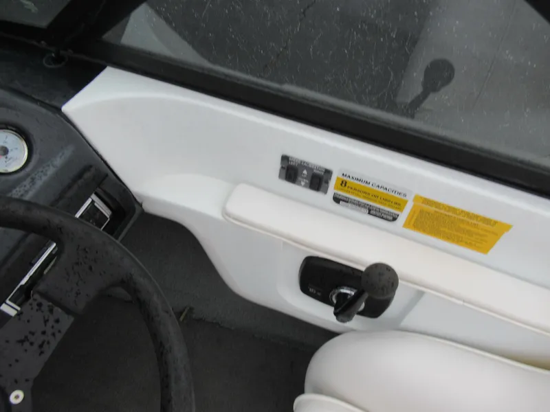 Slide: The Image of Interior view of a 2000 Moomba Outback LS boat dashboard and controls. - 14