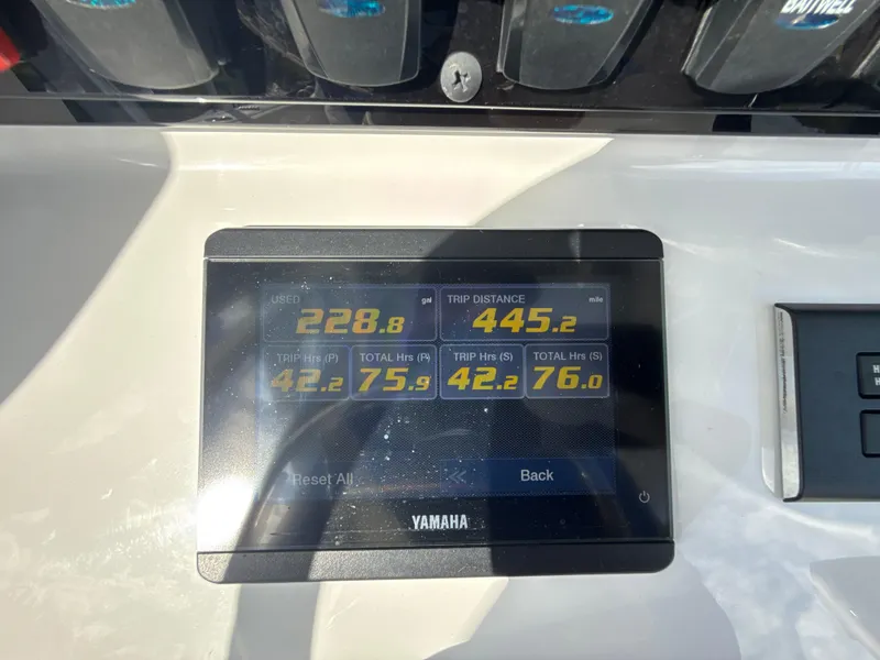 Slide: The Image of Yamaha display on 2024 Sea Hunt Ultra 275 SE showing trip and engine data. - 14