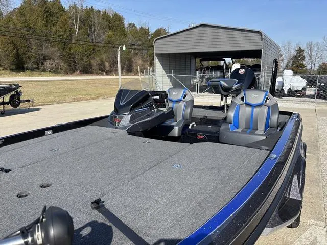 Slide: The Image of 2024 Ranger Z520R boat with advanced navigation equipment on deck. - 12