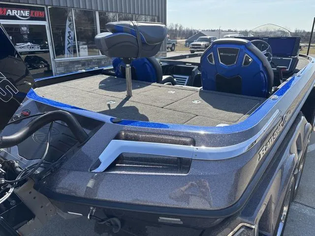 Slide: The Image of 2024 Ranger Z520R boat with dual seats, displayed outside a marine dealership. - 4