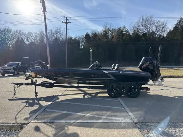 Slide: The Image of 2024 iKon LX20 boat on trailer in sunny outdoor setting. - 17