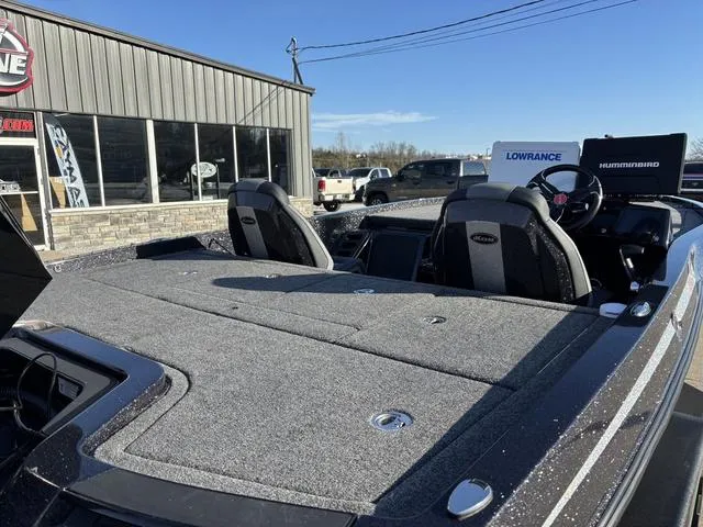 Slide: The Image of 2024 iKon LX20 boat with spacious deck and advanced navigation systems. - 4