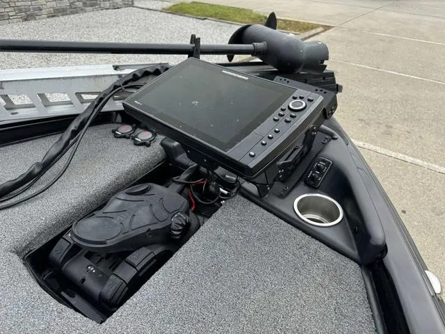 Slide: The Image of 2023 Phoenix 721 Pro XP boat dashboard with advanced navigation system and controls. - 12