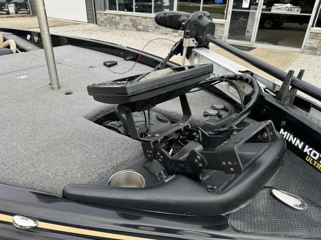 Slide: The Image of 2023 Phoenix 721 Pro XP boat with Minn Kota trolling motor and advanced fishing equipment. - 14