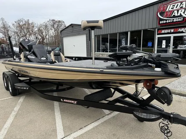 Slide: The Image of 2023 Phoenix 721 Pro XP boat on trailer, parked outside dealership. - 15