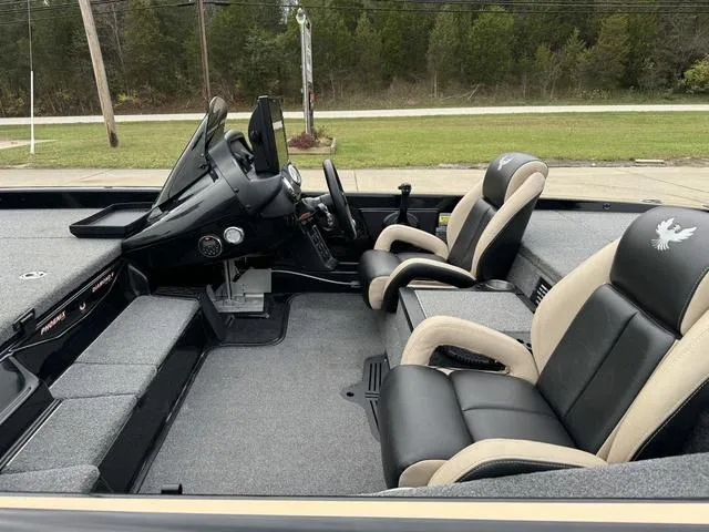 Slide: The Image of 2023 Phoenix 721 Pro XP boat interior with dual seats and steering console. - 21