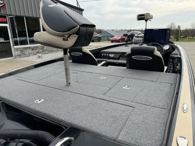 Slide: The Image of 2023 Phoenix 721 Pro XP boat interior with seating and storage compartments. - 5