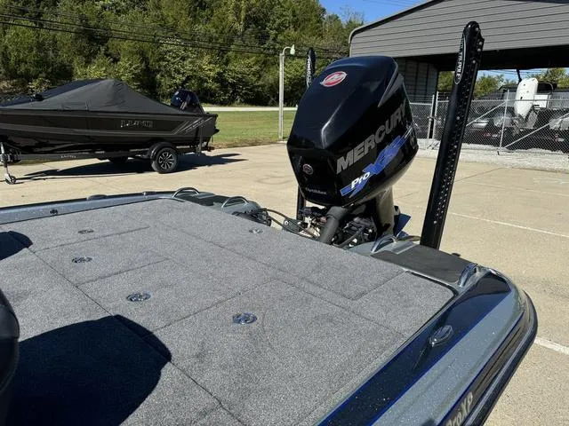 Slide: The Image of 2017 Phoenix 921 PRO XP boat with Mercury engine in a parking area. - 15