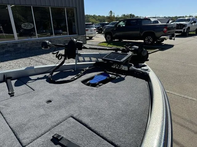 Slide: The Image of 2017 Phoenix 921 PRO XP boat with advanced fishing equipment on deck. - 8