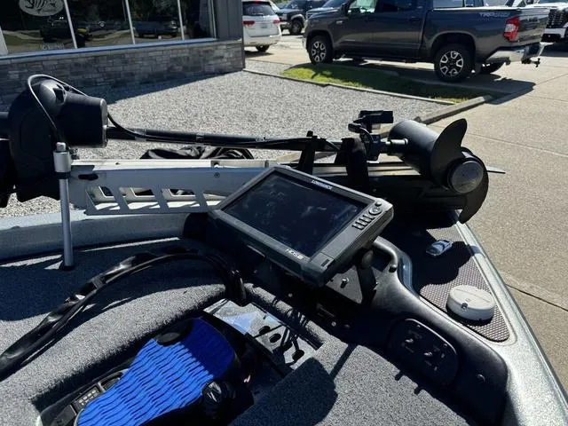 Slide: The Image of 2017 Phoenix 921 PRO XP boat dashboard with navigation equipment and controls. - 9