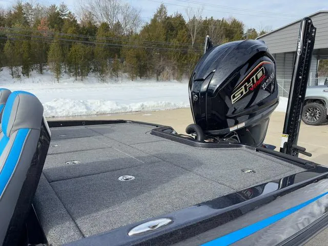 Slide: The Image of iKon LX20 boat with powerful engine, sleek design, and spacious deck, 2025 model. - 19