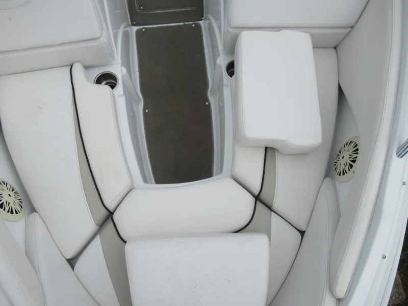 Slide: The Image of Interior seating of a 2009 Azure AZ208 boat with white upholstery. - 18