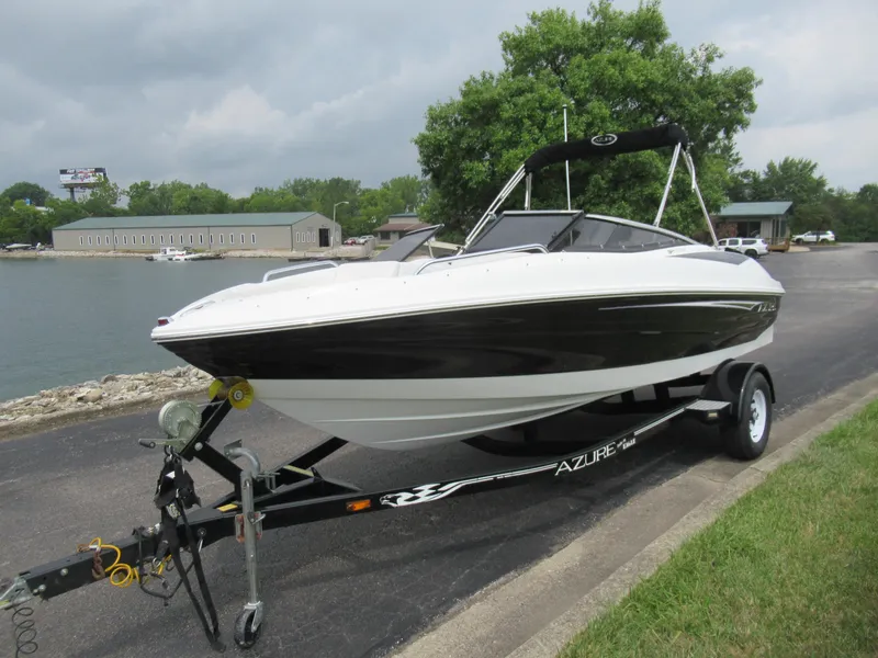 Slide: The Image of 2009 Azure AZ208 boat on trailer by lakeside, overcast sky. - 9