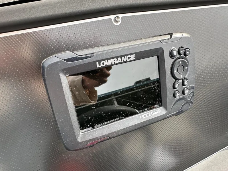 Slide: The Image of Lowrance Hook fish finder on 2024 Ranger Z518 boat dashboard. - 17