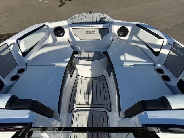Slide: The Image of 2025 Yamaha Boats 222SD interior, featuring sleek seating and modern design elements. - 4