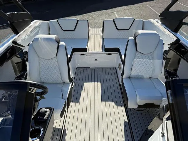 Slide: The Image of 2025 Yamaha Boats 222SD interior with luxurious white seating and modern design. - 7