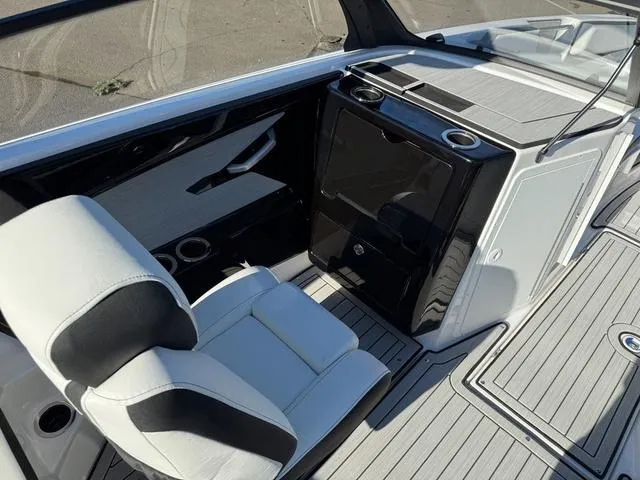 Slide: The Image of 2025 Yamaha Boats 222SD interior with sleek seating and modern design. - 8