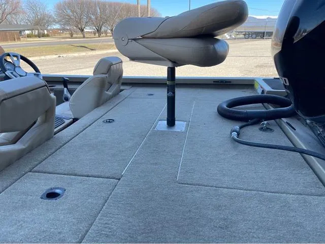 Slide: The Image of 2022 G3 Sportsman 1910 boat interior with seating and carpeted deck. - 5