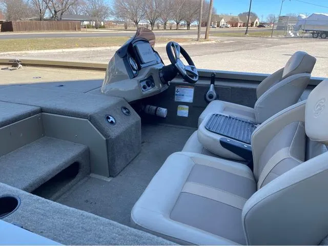 Slide: The Image of 2022 G3 Sportsman 1910 boat interior with steering console and seating. - 6