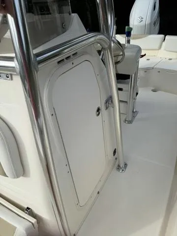 Slide: The Image of 2023 Bulls Bay 200CC boat interior with stainless steel railings and seating. - 10