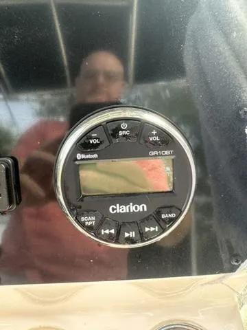 Slide: The Image of Close-up of Clarion GR10BT stereo on 2023 Bulls Bay 200CC boat dashboard. - 13