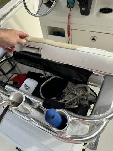 Slide: The Image of 2023 Bulls Bay 200CC boat console with storage, steering wheel, and accessories. - 21