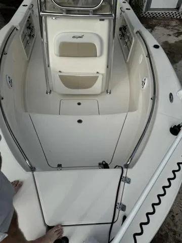 Slide: The Image of 2023 Bulls Bay 200CC boat interior with seating and storage compartments. - 4