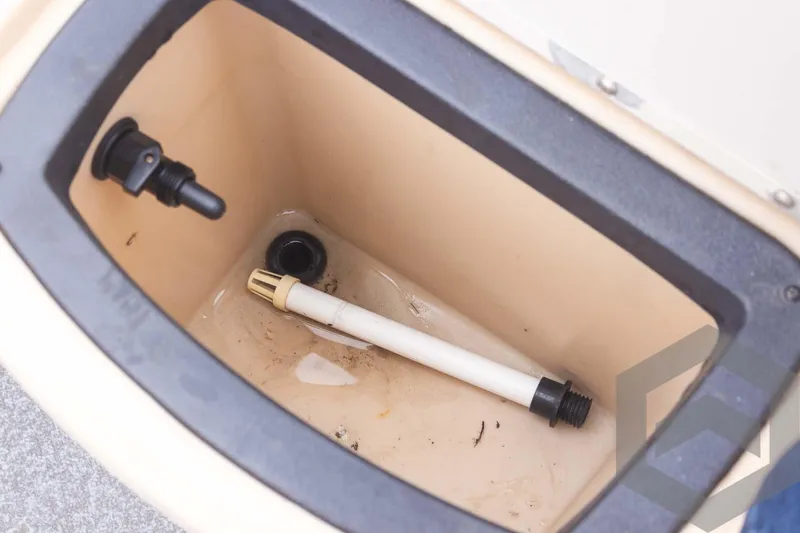 Slide: The Image of Livewell compartment of 2015 Sun Tracker Fishin' Barge 22 DLX with drainage pipe. - 20