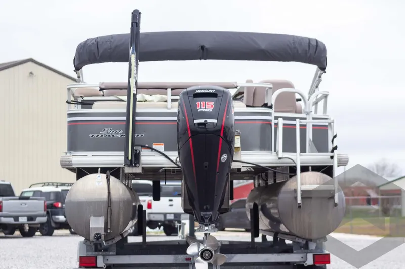 Slide: The Image of 2015 Sun Tracker Fishin' Barge 22 DLX pontoon boat with Mercury 115 outboard motor. - 5
