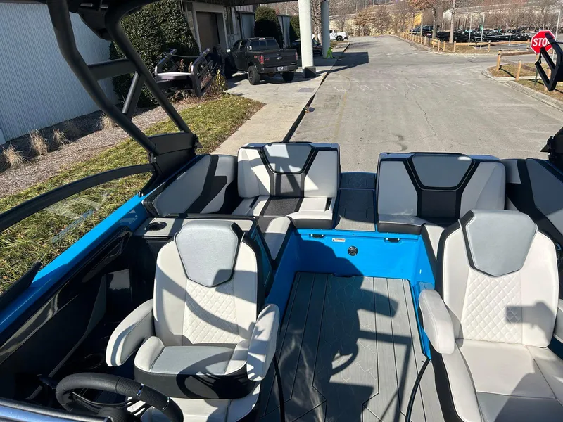 Slide: The Image of 2023 Yamaha Boats 255XD interior with modern seating and sleek design. - 6