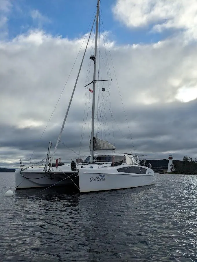 Slide: The Image of 2020 Seawind 1260 catamaran sailing on a cloudy day. - 3